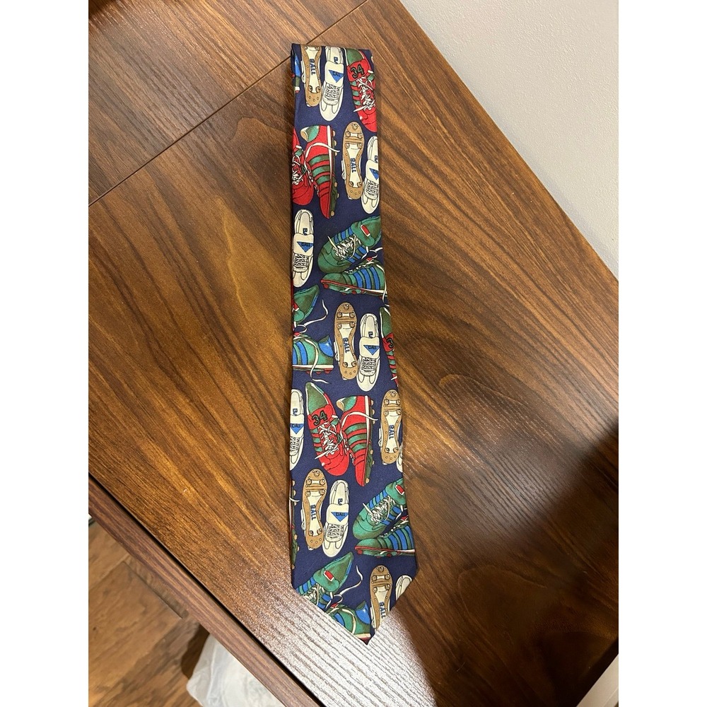 Tie‎